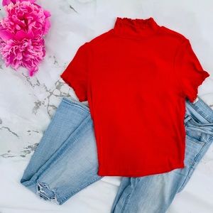 Red short sleeve turtleneck.